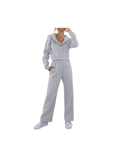 Woman wearing a trendy two-piece lounge set with a zip-up cropped hoodie and drawstring sweatpants, perfect for casual wear or workouts.